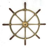 A brass ship's wheel stamped 'Brown Bros. & Co. Ltd., Rosebank Ironworks, Edinburgh', with turned