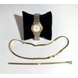 A Raymond Weil ladies Tango wrist watch and two gilt chains.