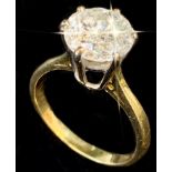 A solitaire diamond ring set in 18ct yellow gold, the stone measures 2.6ct, brilliant round cut,