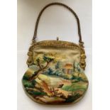 Tapestry evening purse with ornate gilt frame made by Finnegans of New Bond St. Tapestry depicts