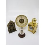 A brass and painted steel money bank, late 19th century, a brass hand lamp, a Mullard valve and a
