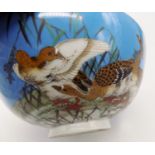 A Japanese porcelain bowl, 19th century, the exterior decorated with geese, the interior decorated