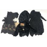 Vintage clothing to include a black lace dress, two black velvet jackets, a black dress with