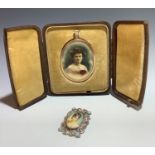 A tooled gilt leather miniature case containing a miniature portrait of a lady together with a