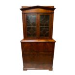 A Dutch mahogany veneered secretaire bookcase, 19th century. (Dimensions: Height 197cm, width