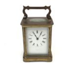A brass cased carriage clock, inscribed to back 'R & Co, Made in Paris', height 10.5cm.