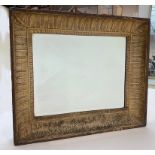 A 19th century wall mirror with a carved wood frame. (Dimensions: Height 51cm x 59.5cm.)(Height 51cm