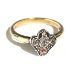 A 9ct gold ring set with diamonds.