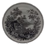A Cambrian pottery dinner plate, circa 1820, transfer printed in black with the 'Swiss Villa'