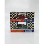 Scalextric: Ferrari P4 and Ford Mirage cars, mint, boxed.