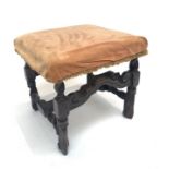 An oak stool, early 18th century, with a padded top. (Dimensions: Height 44cmn, width 47cm.)(