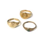 Two gold signet rings and one other ring