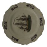 An early 19th century maritime creamware plate, with black transfer printed and hand coloured