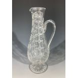 A Victorian cut and engraved glass claret jug. (Dimensions: Height 27.5cm.)(Height 27.5cm.)Condition