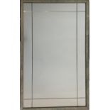 A mid 20th century shagreen framed mirror, with ivorine roundel verso 'Heal & Son Ltd London W'. (