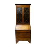 An Edwardian inlaid mahogany bureau bookcase. (Dimensions: Height 197cm,  width 76cm.)(Height 197cm,