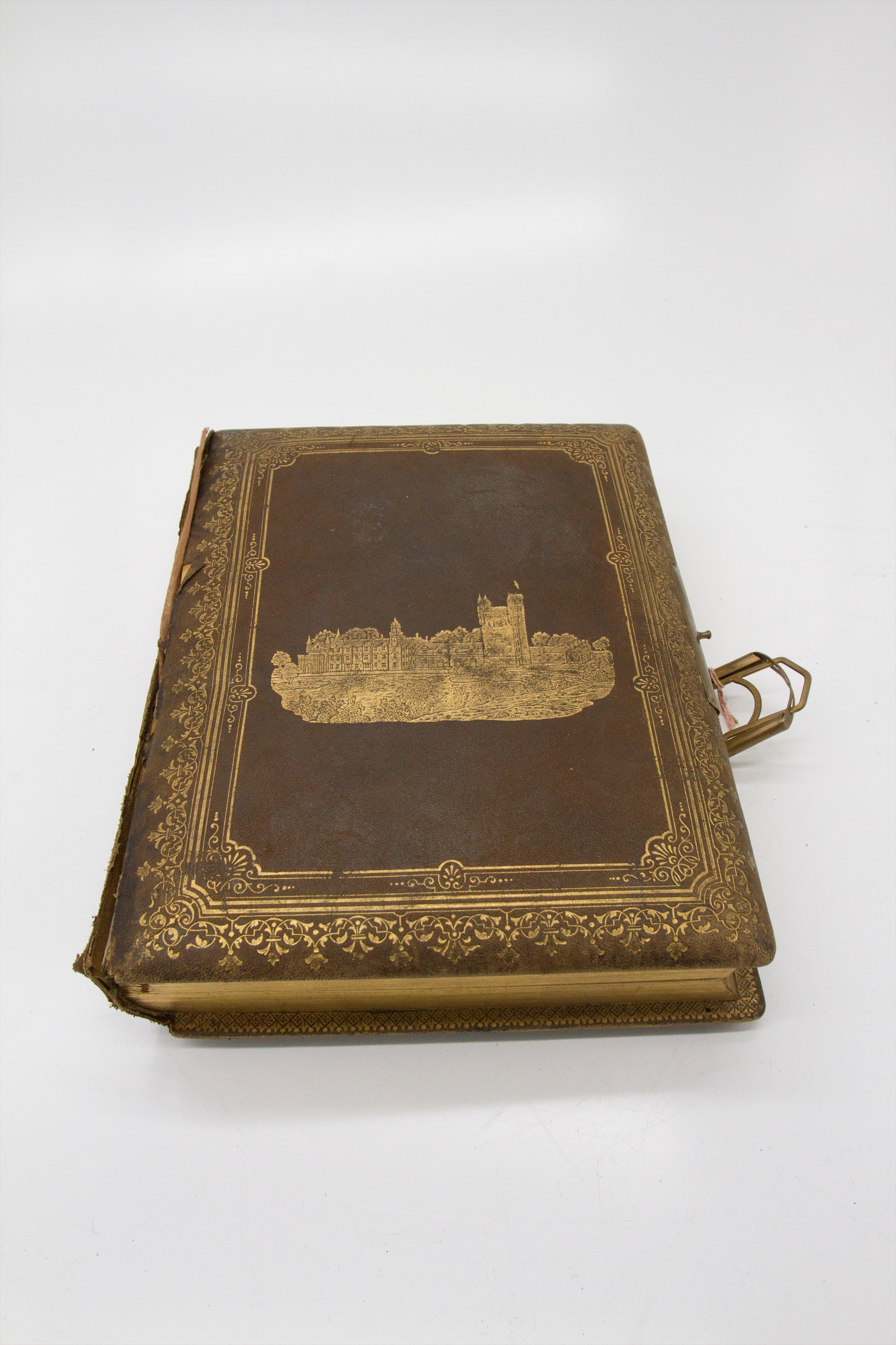 A late 19th/early 20th century leather-bound musical photograph album, the pages illustrated with