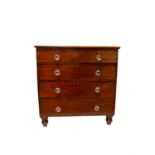 A Victorian mahogany chest of drawers, with two short and three long drawers each with glass