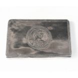 A rectangular silver box, the lid with engraving and central Maria Theresa thaler.