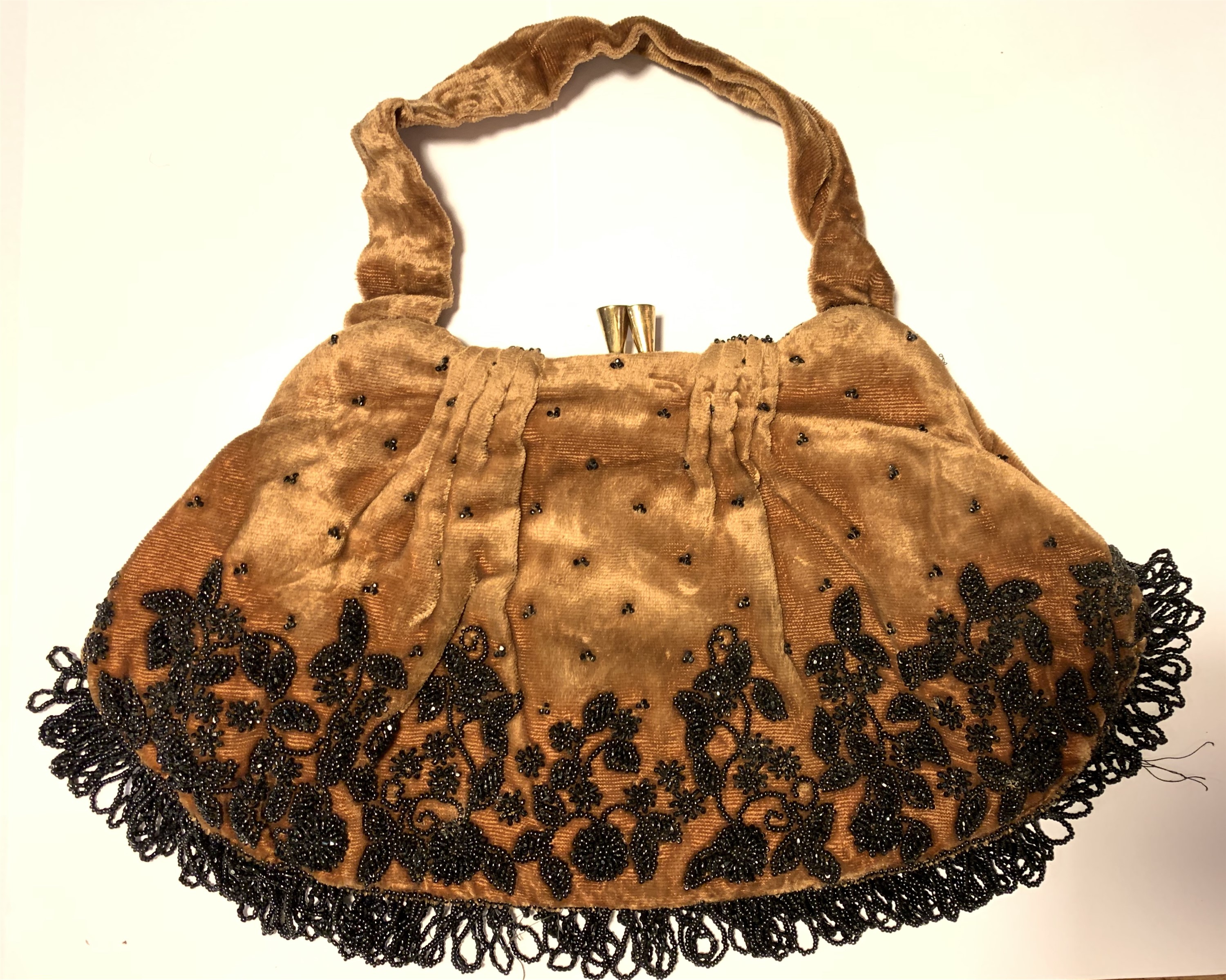 Brown velvet evening clutch purse with elaborate foliate decoration and fringing in jet seed