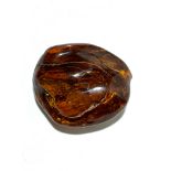 A large piece of amber, 7.6 x 6.5 x 3.3cm, 90g.