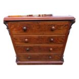 A Victorian mahogany secretaire chest, the top drawer with a fitted interior above three long