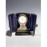 A silver Mappin and Webb balloon cased clock, in leather case. Height 7.5cm (Qty: 1)