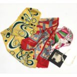 A Bvlgari square, an Emilio Pucci silk scarf, and two other scarves (4).