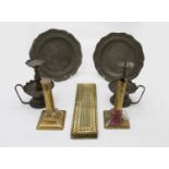 A set of five pierced brass finger plates,height 28.5cm, pair of brass candlesticks, two pewter