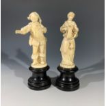 Two Dieppe ivory figures 'Hebe' and 'Sir John Falstaff', 19th century, each on an ebonised wooden
