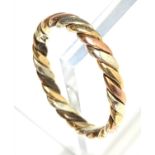 A spiral gold ring.