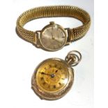 A ladies gold cased wrist watch and a 9ct gold open gold face keyless fob watch.