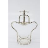 A Mappin Brothers silver plated lemon squeezer, raised on high stand and with screw squeezer. (
