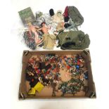 A large quantity of vintage soldiers, together with action men and accessories, together with a Chad