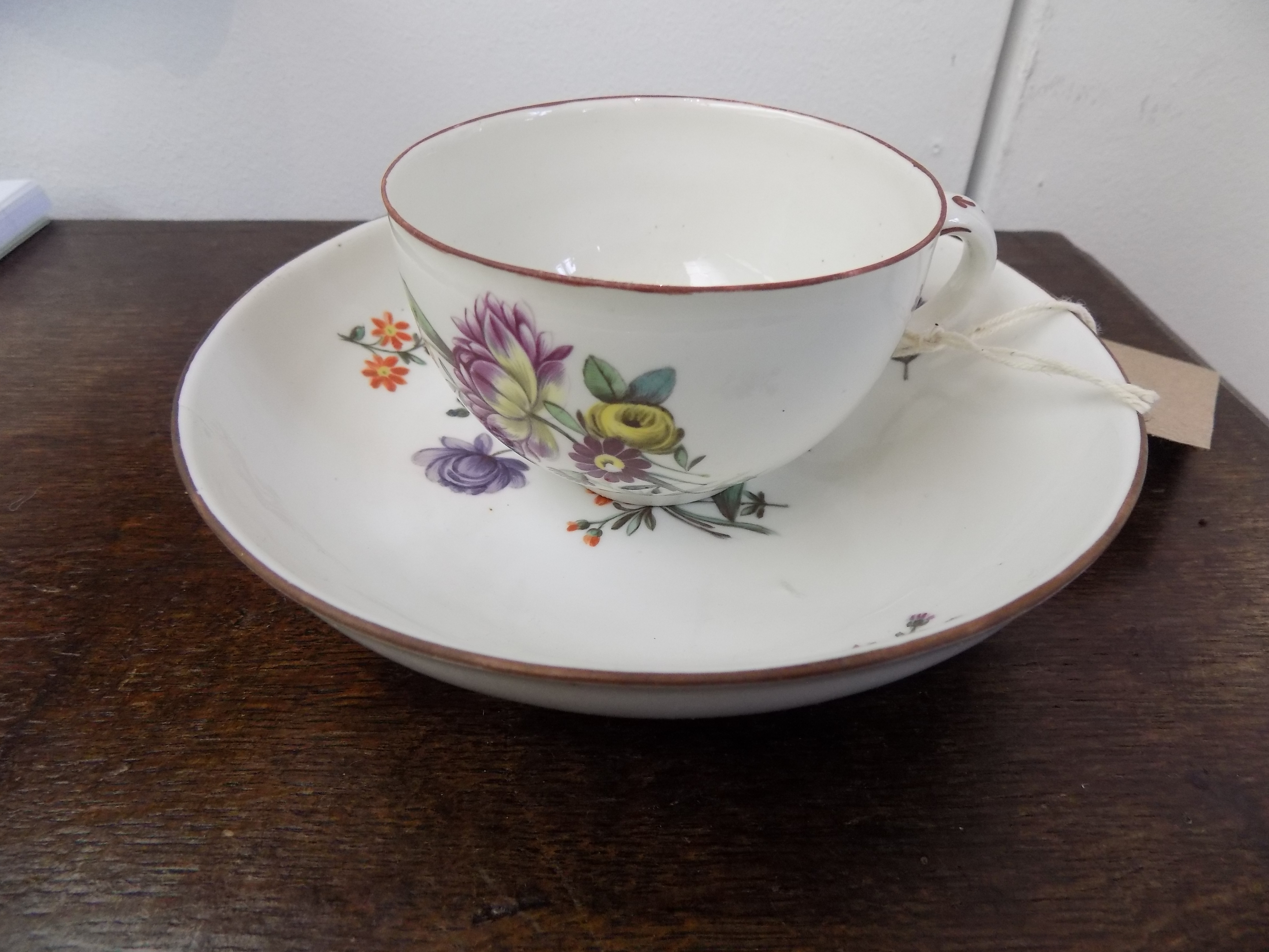 An 18th century Frankenthal teacup and saucer painted with floral sprays.Condition report: See - Image 7 of 11