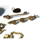Gold brooches and other gold
