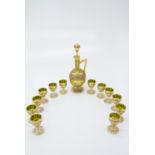 A suite of Venetian gilt glassware comprising a decanter and twelve liqueur glasses. (Dimensions: