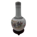 A Chinese Republic Period porcelain vase, decorated with female figures amongst clouds,
