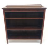 A inlaid mahogany open bookcase, early 20th century, with plaque inscribed 'Robson and Sons Ltd,