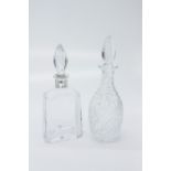 An Orrefors Sweden heavy crystal decanter, the silver collar stamped 925, height 28cm, together with