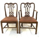 A set of eight George III style mahogany dining chairs, including two carvers, each with as vase