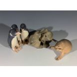 Three Royal Copenhagen ornaments - penguin group, puppy and beaver.Condition report: No condition