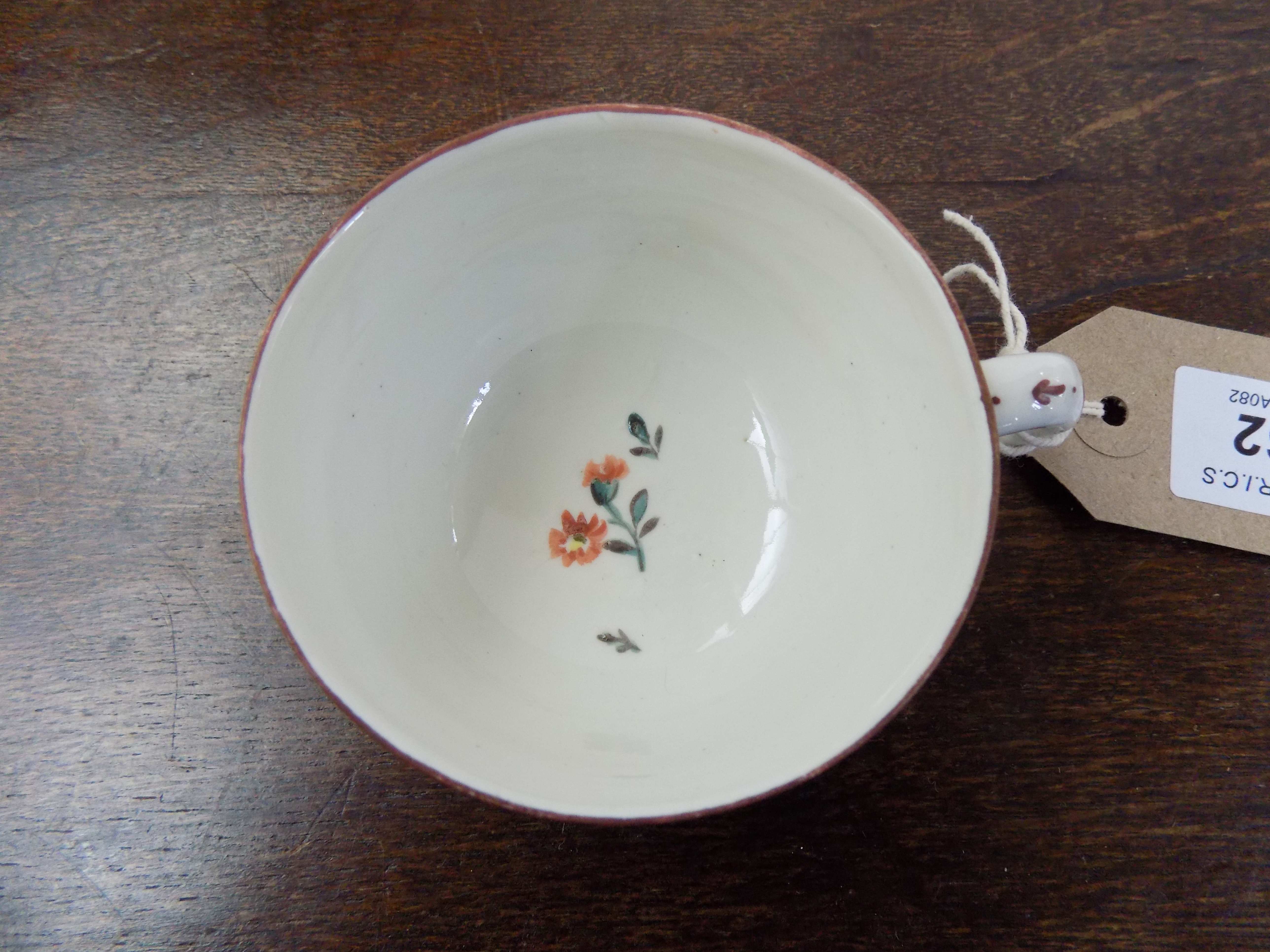 An 18th century Frankenthal teacup and saucer painted with floral sprays.Condition report: See - Image 6 of 11