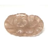 A Chinese carved rose quartz chrysanthemum panel, 49x30mm.