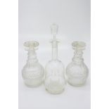 A pair of 19th century triple ring neck decanters, with mushroom stoppers, height 24cm, together
