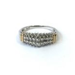 A 10ct gold ring with rows of diamonds.