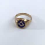 A 9ct gold Masonic ring with rotating blue enamelled Masonic panel.