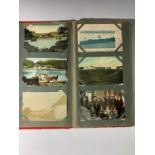 Postcards. Album containing collection of Cornish postcards including real photographic examples