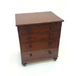 A Victorian mahogany commode, with a hinged lift up top, four dummy drawers on turned feet. (