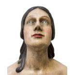 A reproduction fibreglass ship's head, modelled as a woman in a blue dress with a rose. (Dimensions: